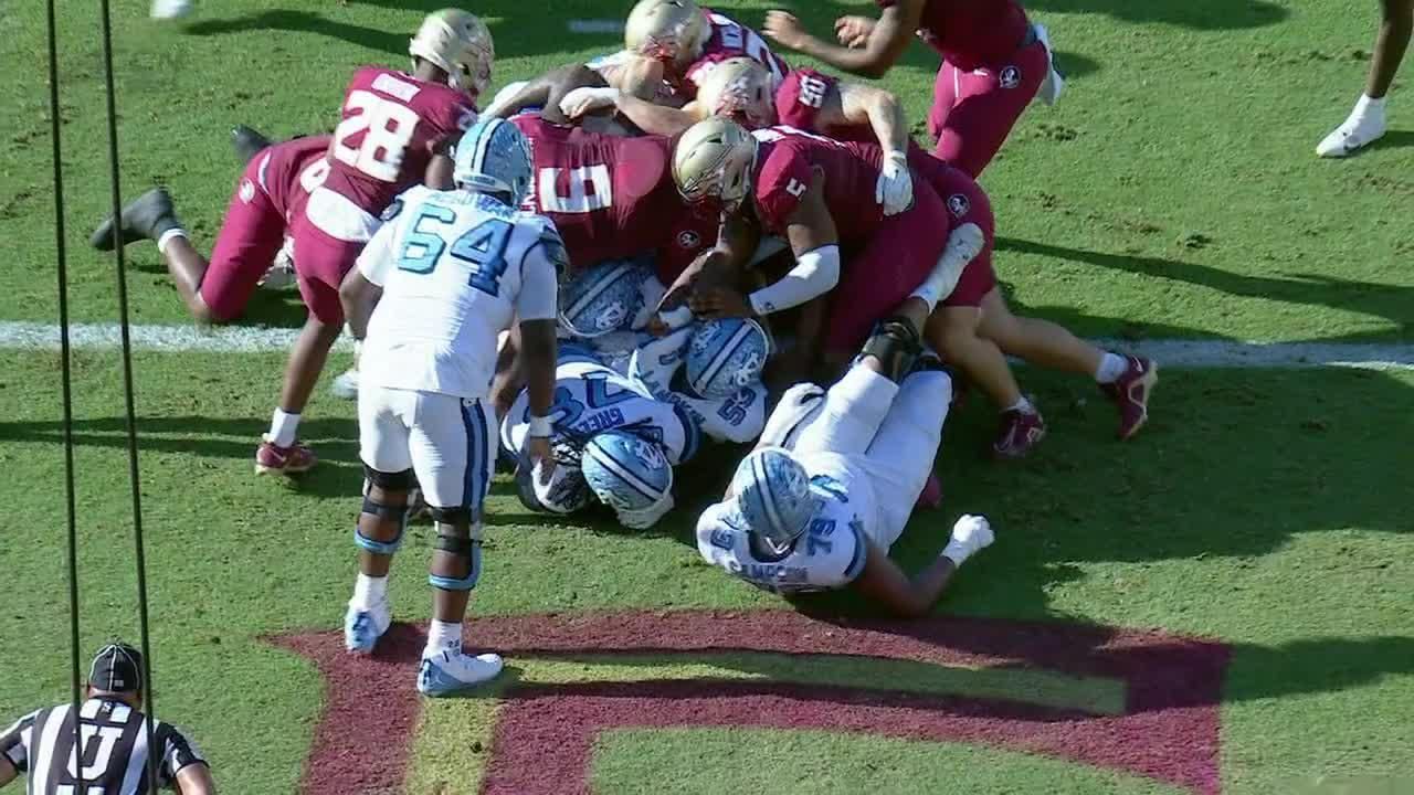 Omarion Hampton punches in the TD for North Carolina